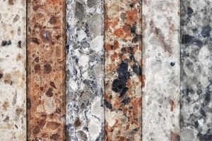 Close-up of various types of granite. Image of six granites with unique colors and crystals.