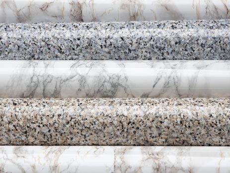 Typical image on the dilemma "marble vs granite”. Close-up of natural materials including marble and granite