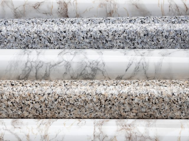 Typical image on the dilemma "marble vs granite”. Close-up of natural materials including marble and granite